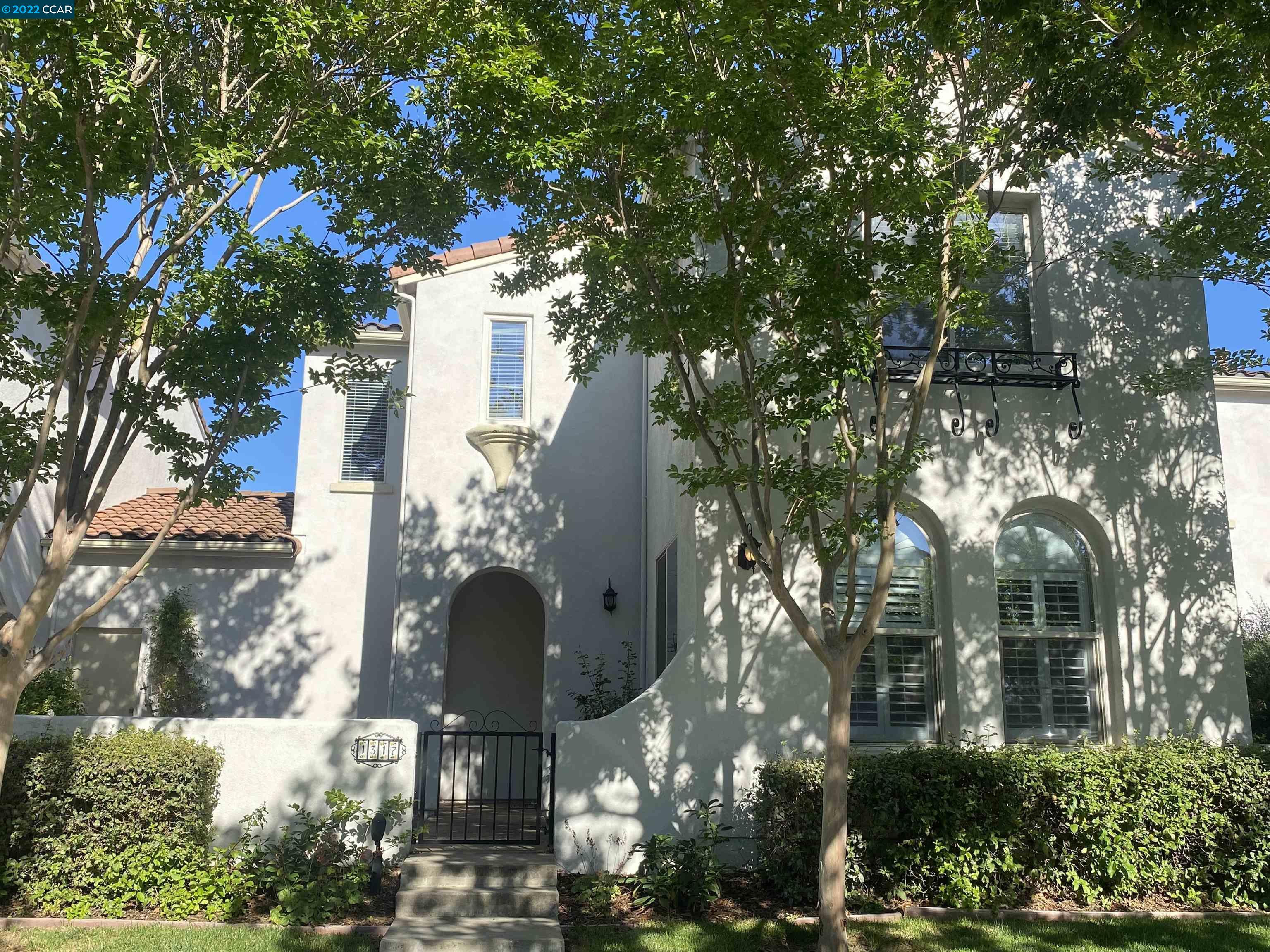 1317 Amaryllis Circle San Ramon, CA 94582 - Photo 3 of 24 a view of a fountain in the middle of a yard
