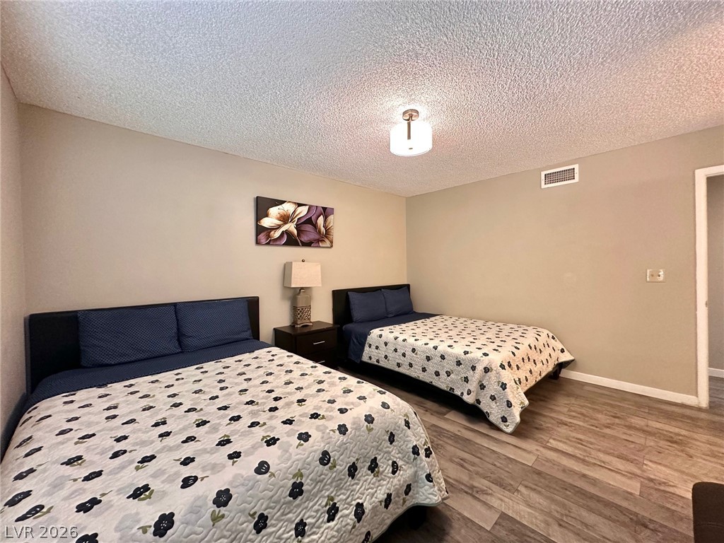 2340 Viewcrest Road Henderson, NV 89014 - Photo 17 of 36 This inviting space features durable flooring, offering both comfort and practicality for any lifestyle.