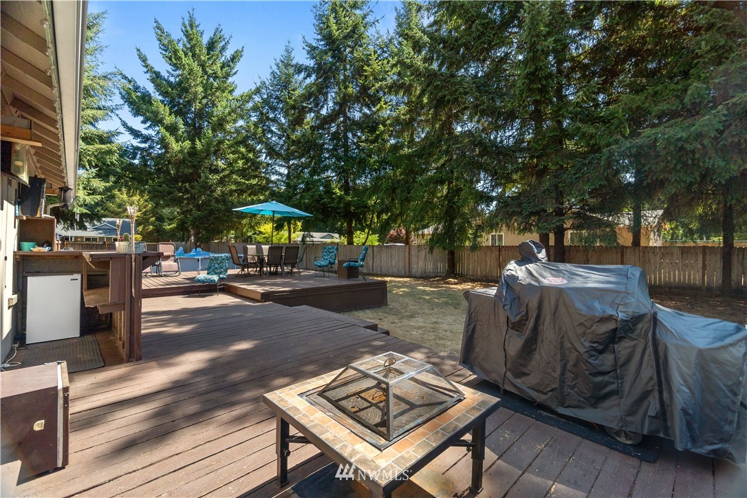 5037 180th Trail Southwest Rochester, WA 98579 - Photo 22 of 38 a view of a street with seating space
