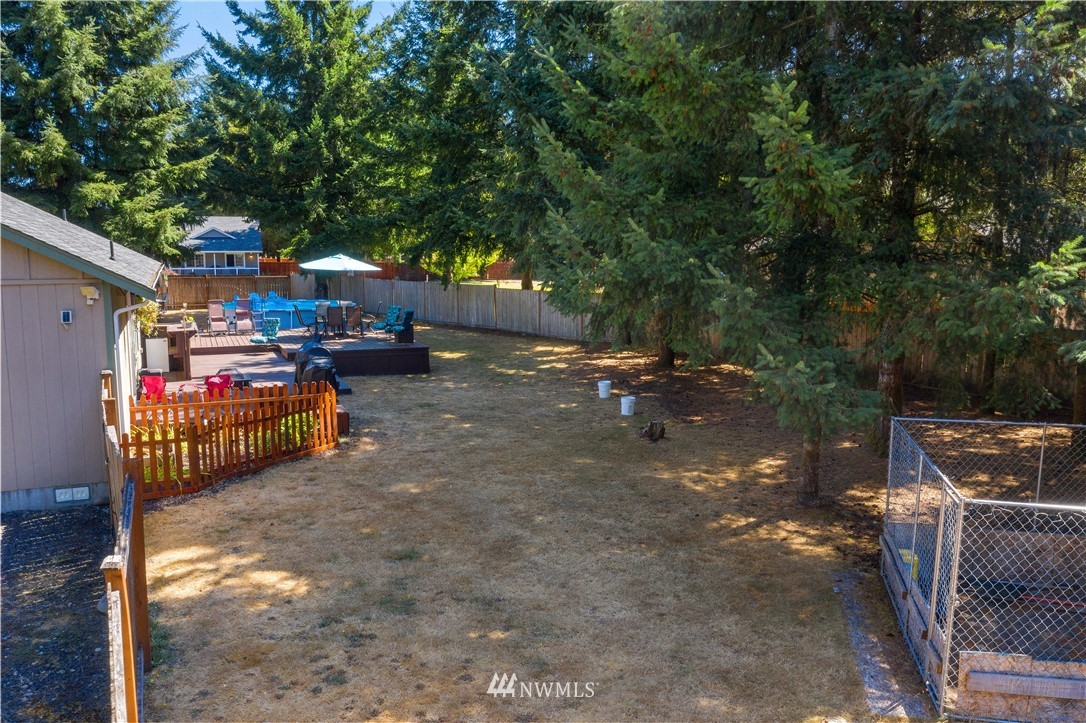 5037 180th Trail Southwest Rochester, WA 98579 - Photo 26 of 38 a view of a outdoor space with sitting area