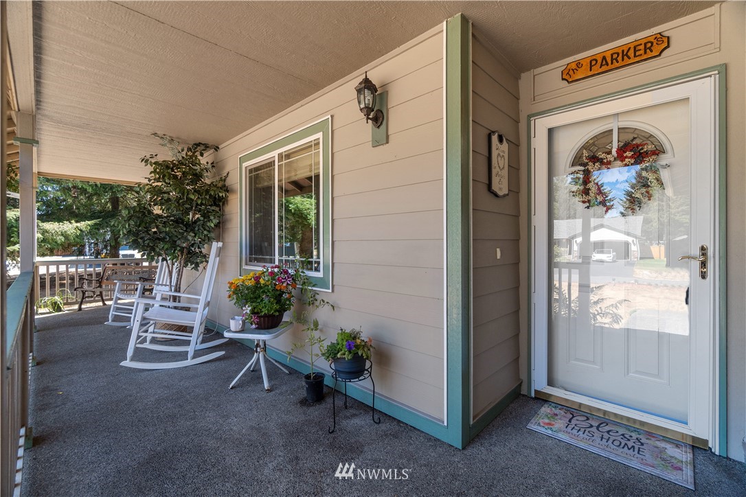 5037 180th Trail Southwest Rochester, WA 98579 - Photo 5 of 38 a view of a porch with furniture