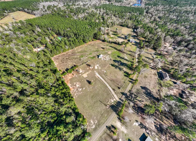 a view of a refrigerator with a trees in the background