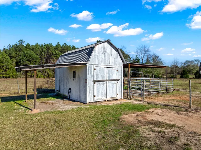 a view of a lake with houses in the back