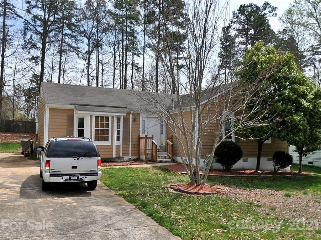 a house view with a garden space