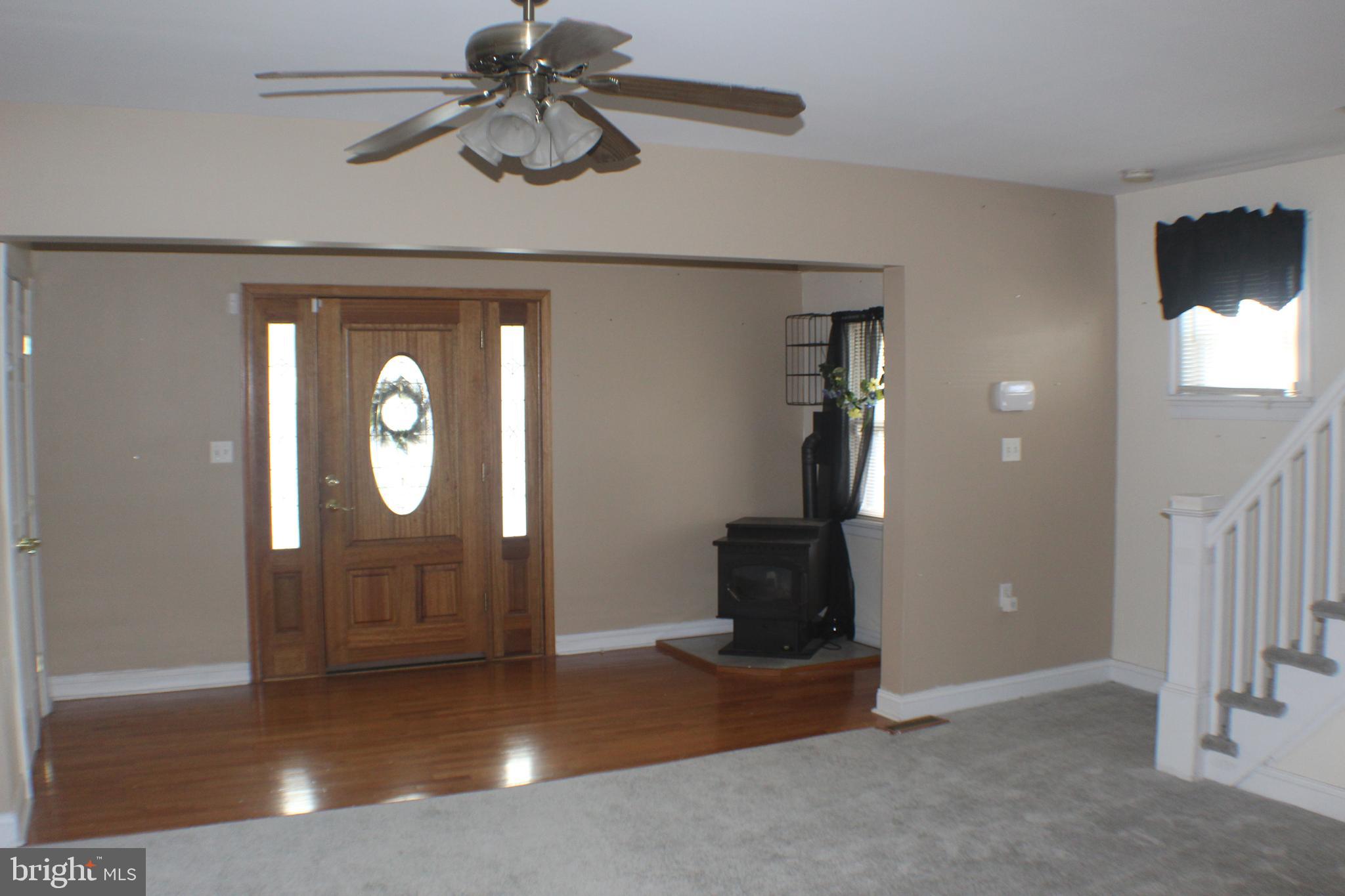 3008 Ritchie Avenue Baltimore, MD 21219 - Photo 8 of 34 a view of a livingroom with wooden floor