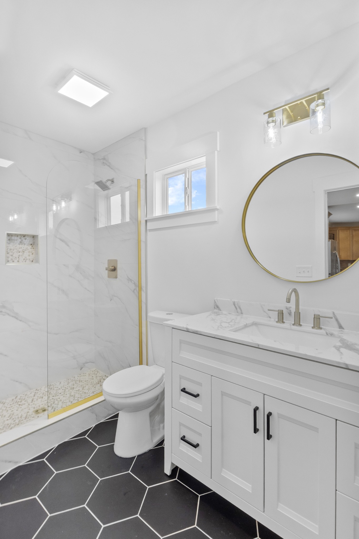 5178 East Robertson Road Cross Plains, TN 37049 - Photo 16 of 27 a bathroom with a toilet sink and a mirror