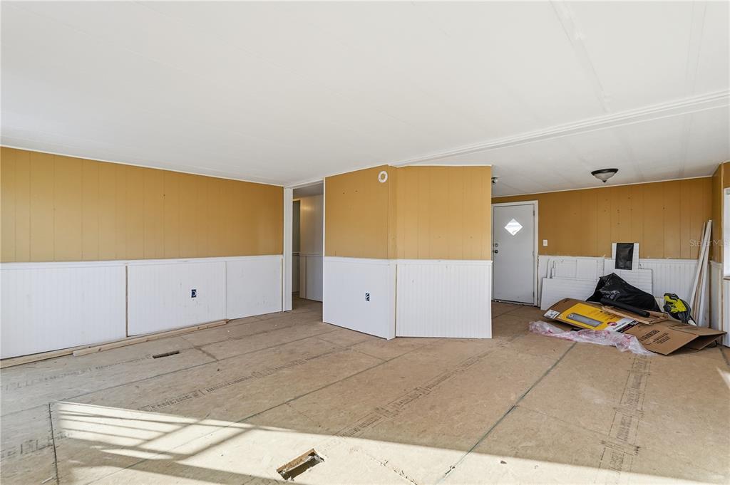 4403 Tucker Square New Port Richey, FL 34652 - Photo 4 of 20 a view of a room with gym equipment