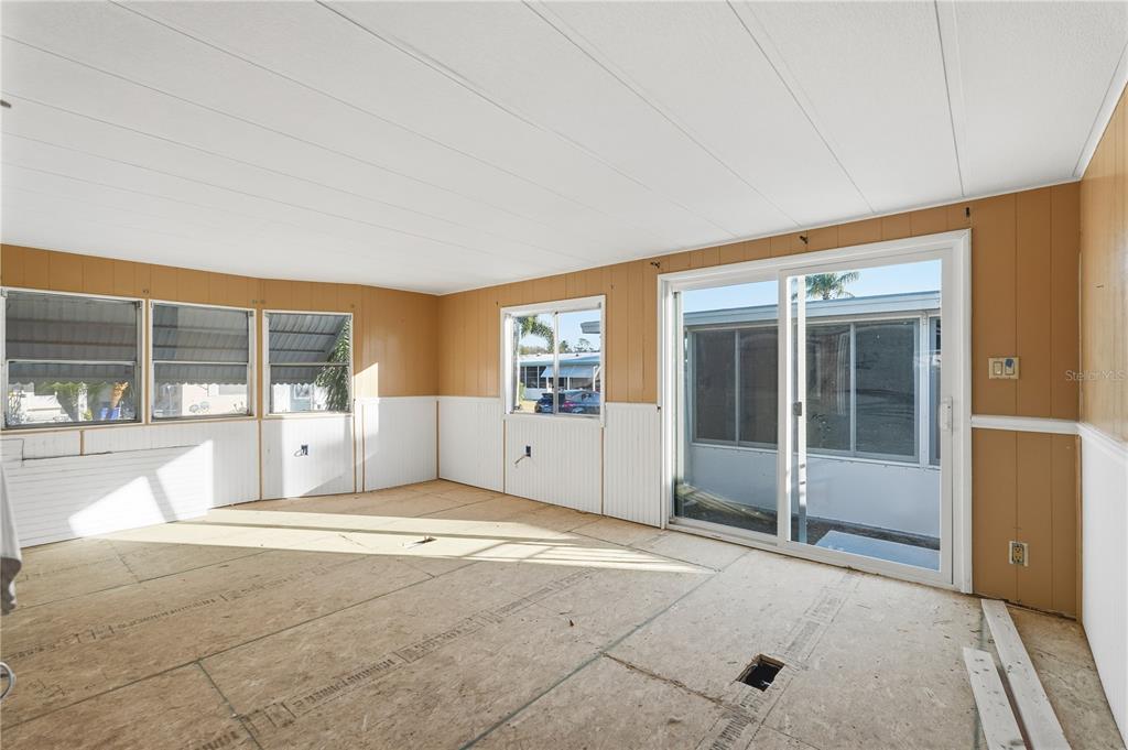 4403 Tucker Square New Port Richey, FL 34652 - Photo 6 of 20 a view of an empty room with window