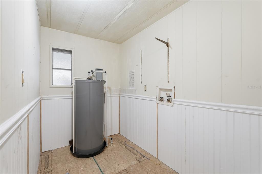 4403 Tucker Square New Port Richey, FL 34652 - Photo 9 of 20 a view of a storage & utility room with closet