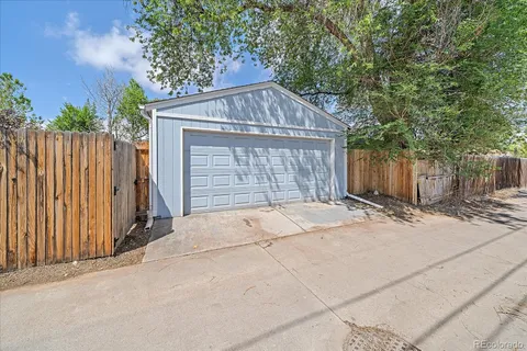 a front view of house with garage