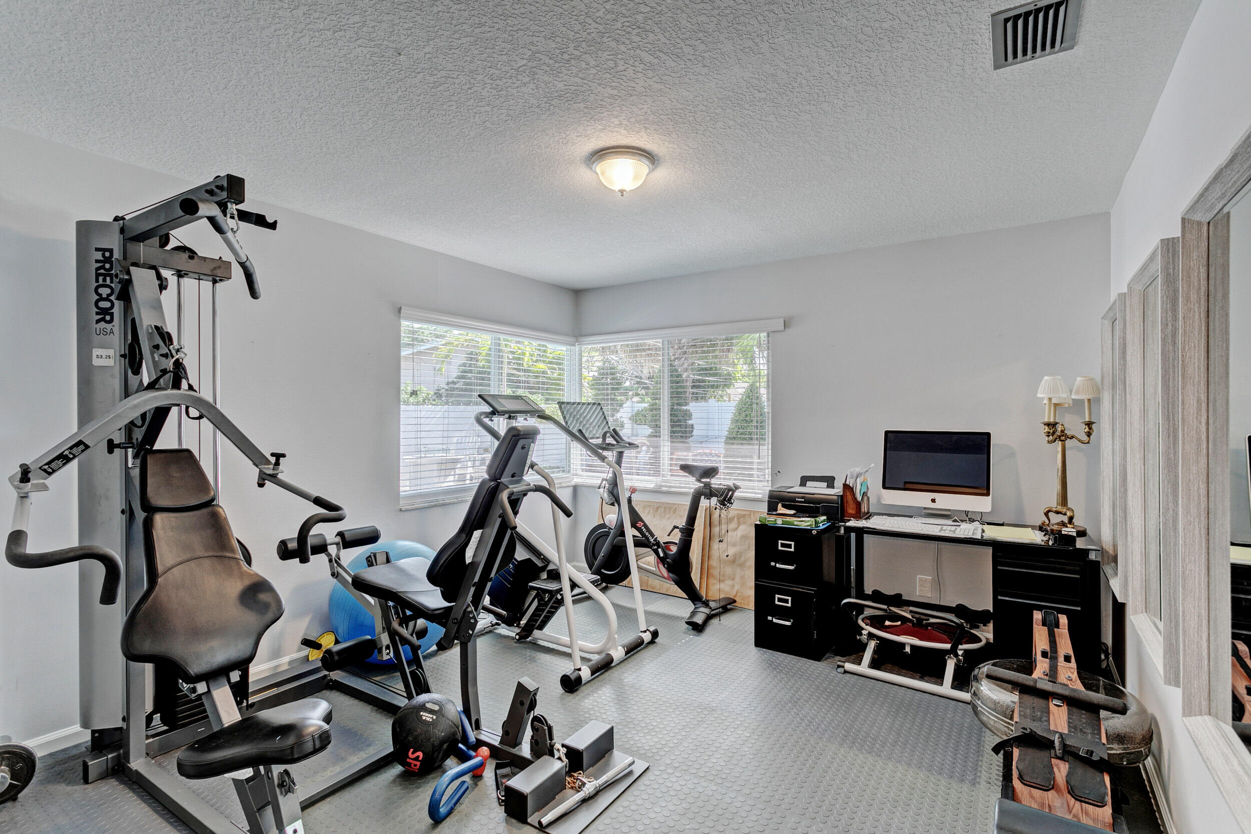 430 Mars Way Juno Beach, FL 33408 - Photo 12 of 65 a view of a room with gym equipment