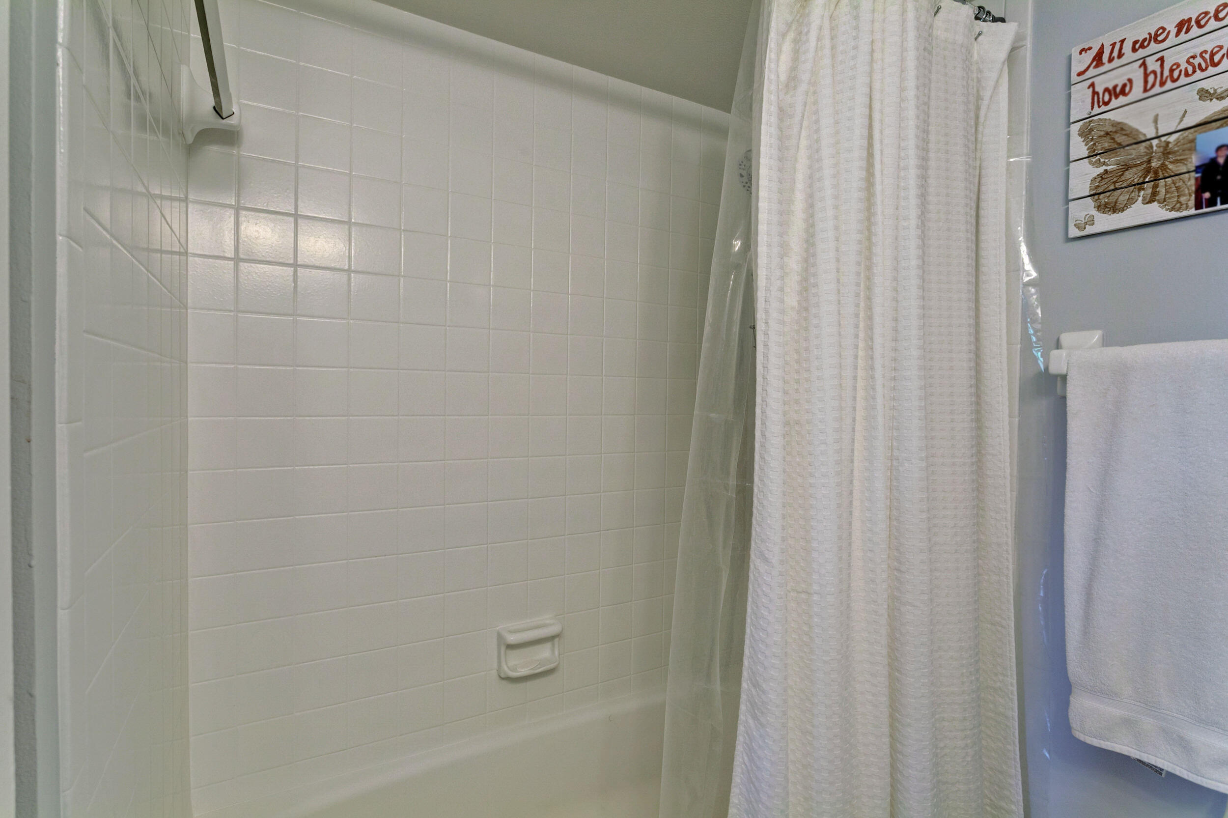 430 Mars Way Juno Beach, FL 33408 - Photo 36 of 65 a bathroom with a shower curtain and a shower curtain