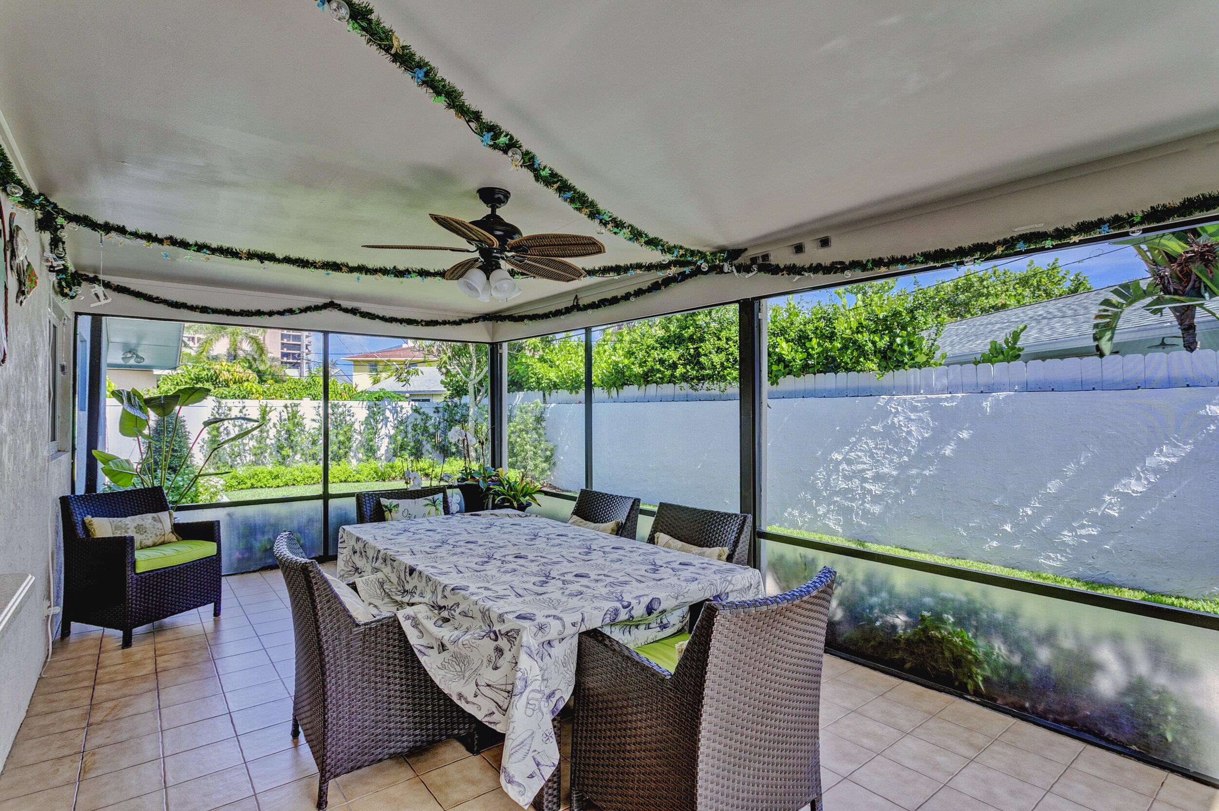 430 Mars Way Juno Beach, FL 33408 - Photo 37 of 65 a view of an outdoor dining space with a table and chairs