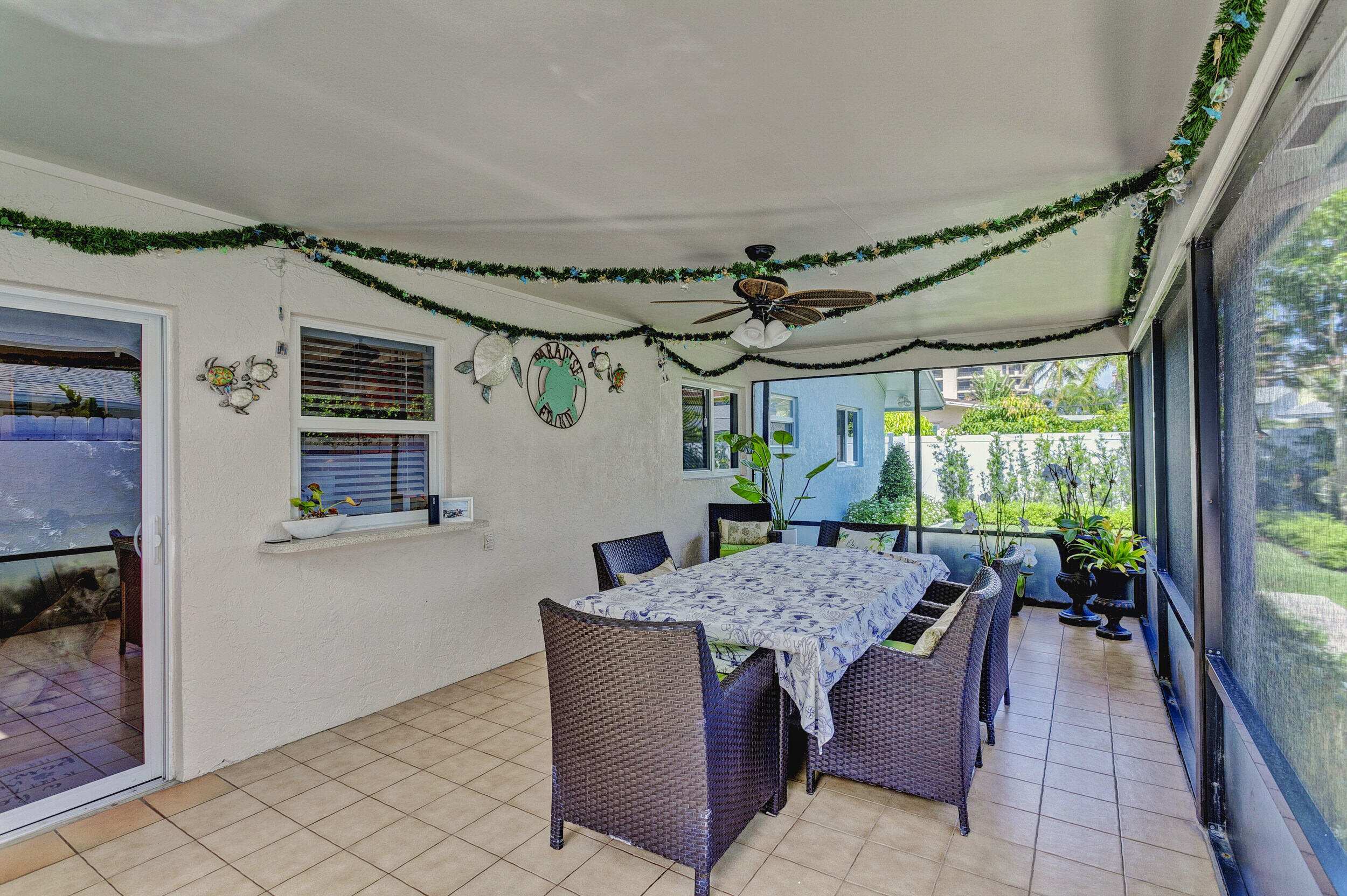 430 Mars Way Juno Beach, FL 33408 - Photo 38 of 65 a view of a dining room with furniture window and outside view