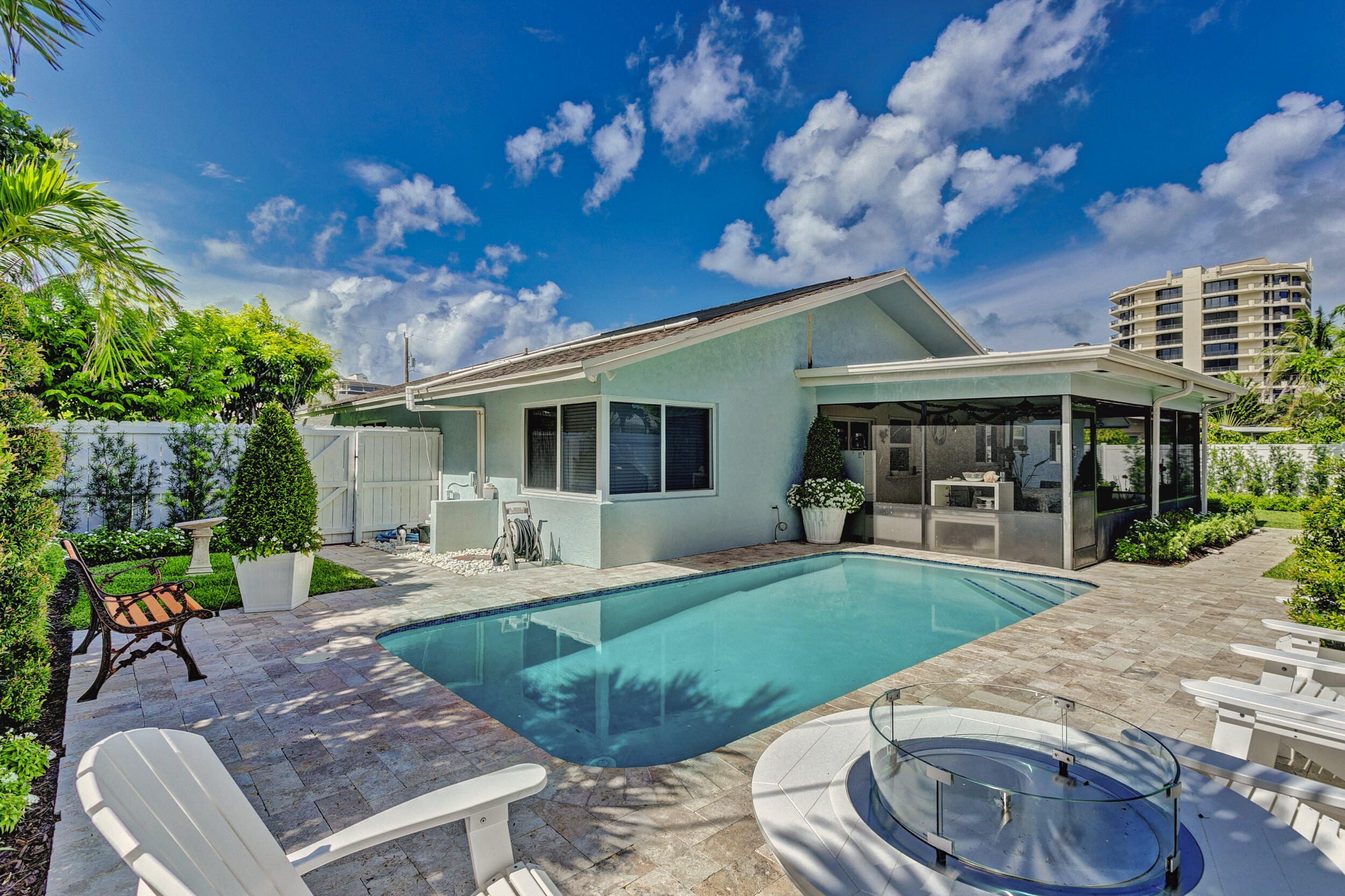 430 Mars Way Juno Beach, FL 33408 - Photo 42 of 65 a view of a house with backyard porch and sitting area