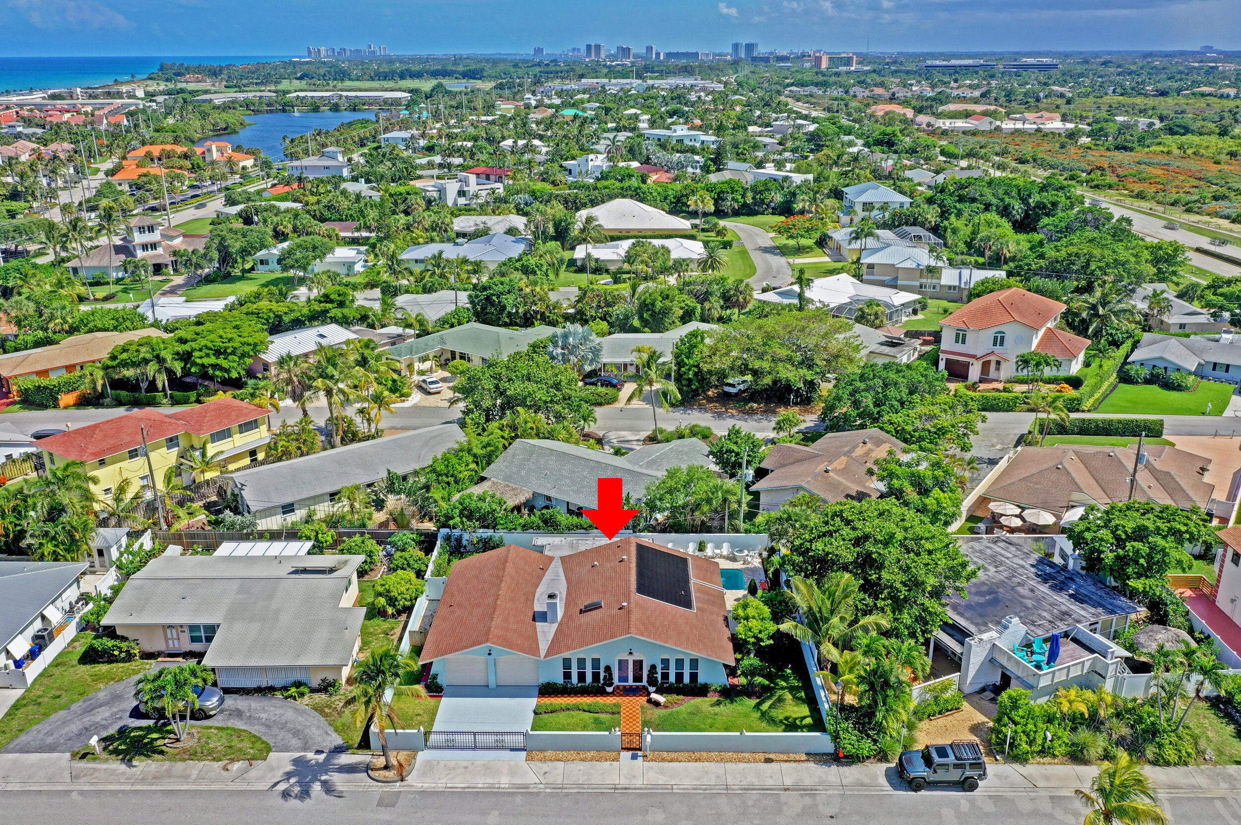 430 Mars Way Juno Beach, FL 33408 - Photo 54 of 65 an aerial view of residential houses with outdoor space and street view