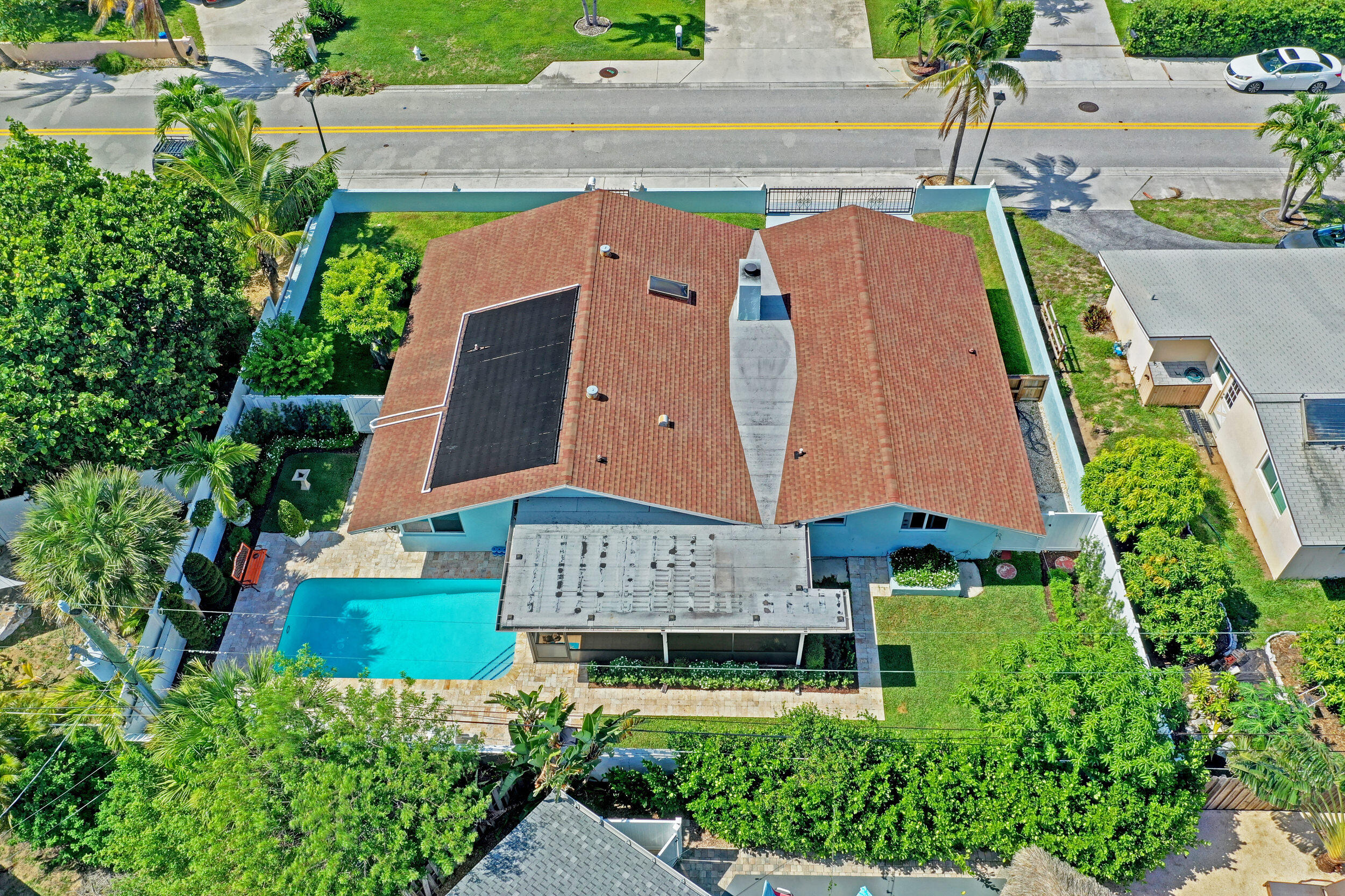 430 Mars Way Juno Beach, FL 33408 - Photo 63 of 65 an aerial view of a house with garden space and street view