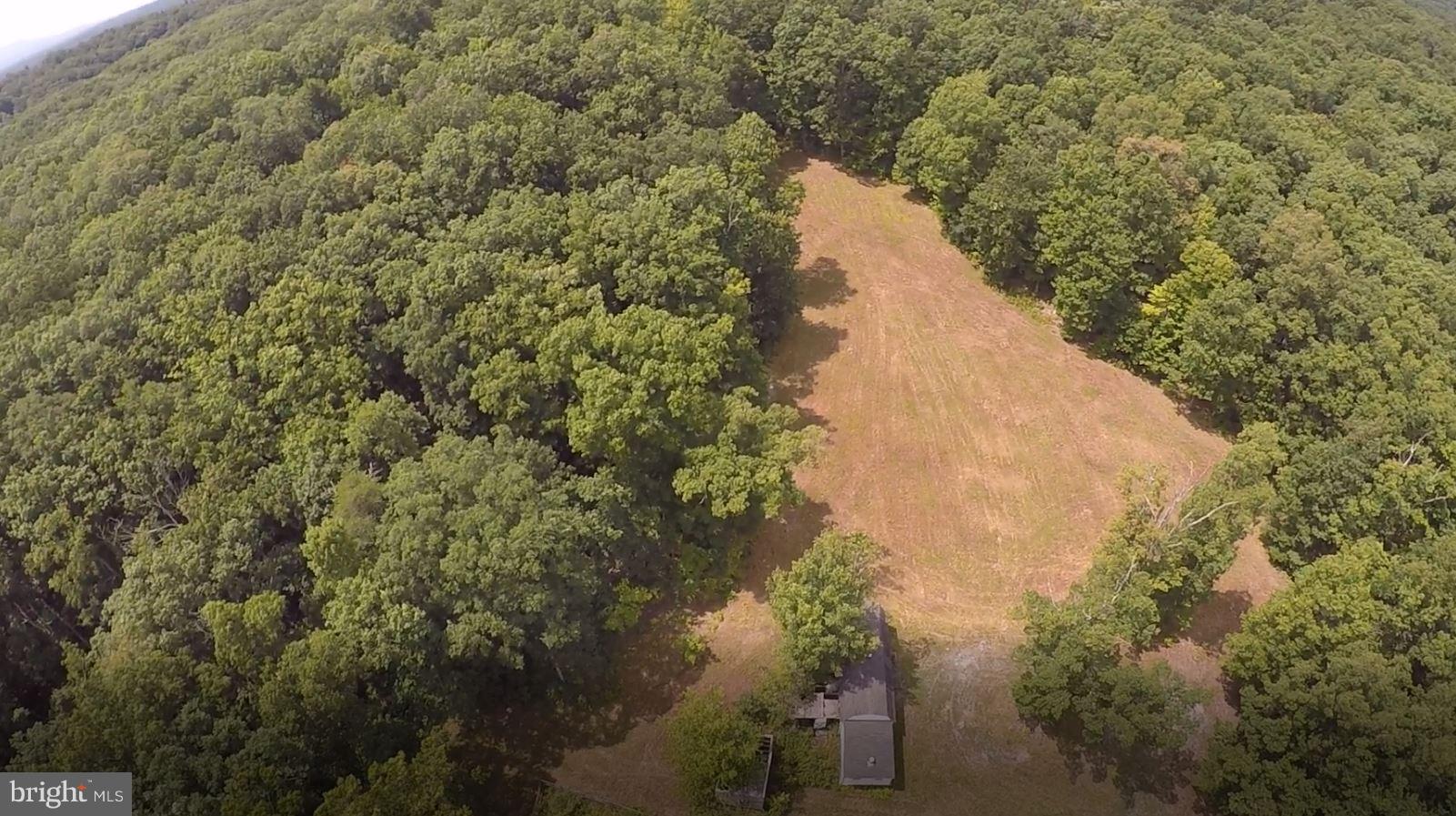 12 Cattle Crossing Road Front Royal, VA 22630 - Photo 22 of 23 a view of a lake with a yard and mountain view