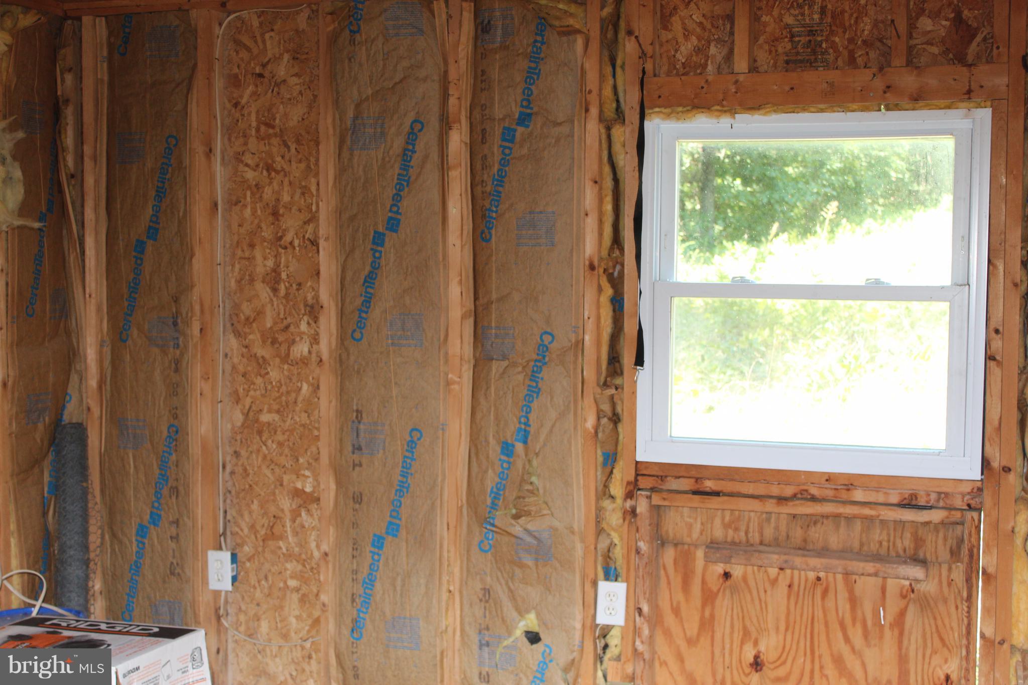 12 Cattle Crossing Road Front Royal, VA 22630 - Photo 10 of 23 a view of a bathroom with a window and a shower