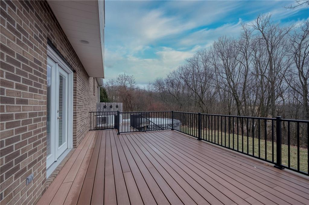274 Evans Road Zelienople, PA 16063 - Photo 34 of 42 a view of a balcony with wooden floor and fence