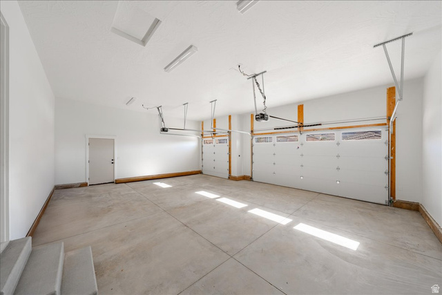 1491 East Centaurus Way, Unit 86 Washington, UT 84780 - Photo 25 of 26 Garage featuring baseboards