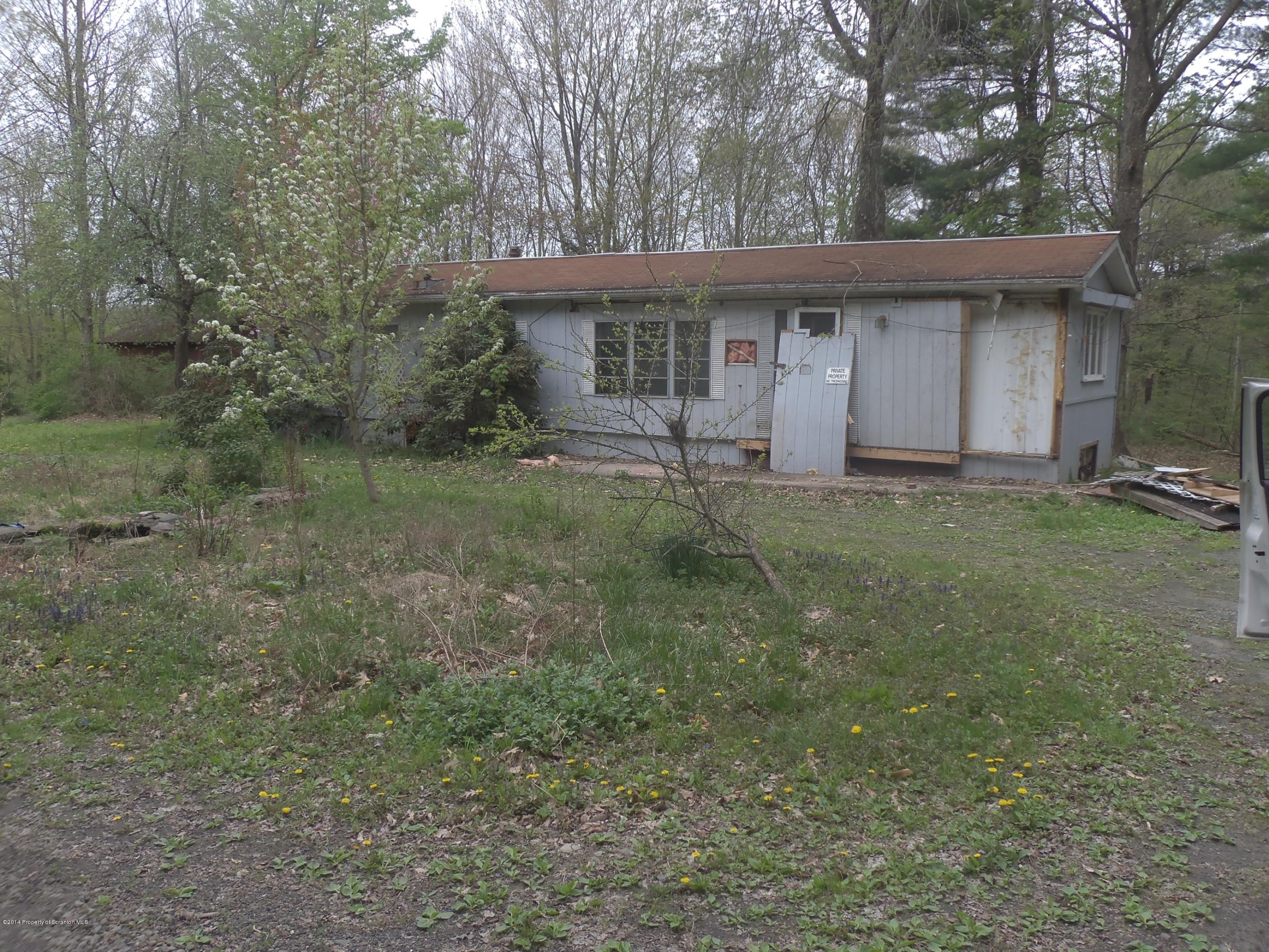 15 Padula Road Tunkhannock, PA 18657 - Photo 1 of 4 a view of a house with a yard
