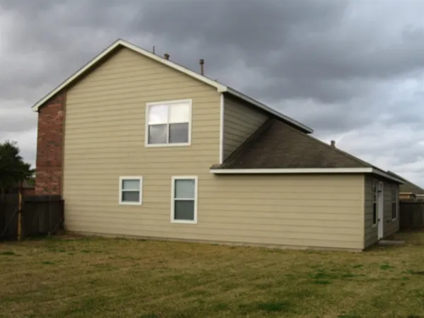 a view of backyard of house