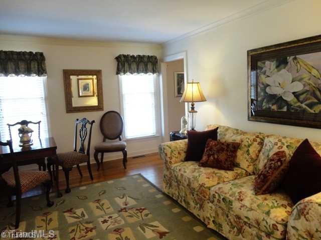 1235 Gatehouse Road High Point, NC 27262 - Photo 3 of 16 Living Room. Large living room is open to the dining room.