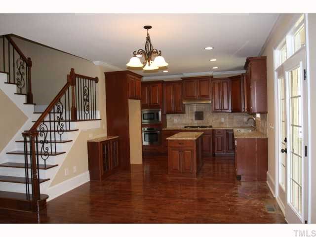3436 Griffice Mill Road Raleigh, NC 27610 - Photo 4 of 10 a view of kitchen with cabinets and wooden floor