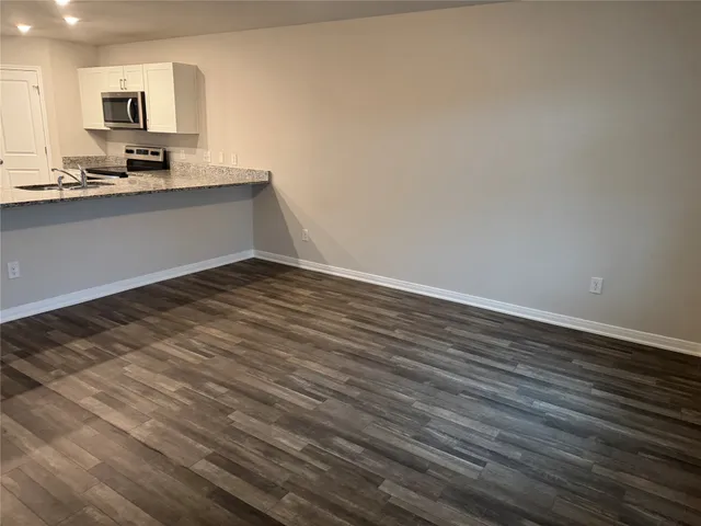 a view of kitchen sink and microwave