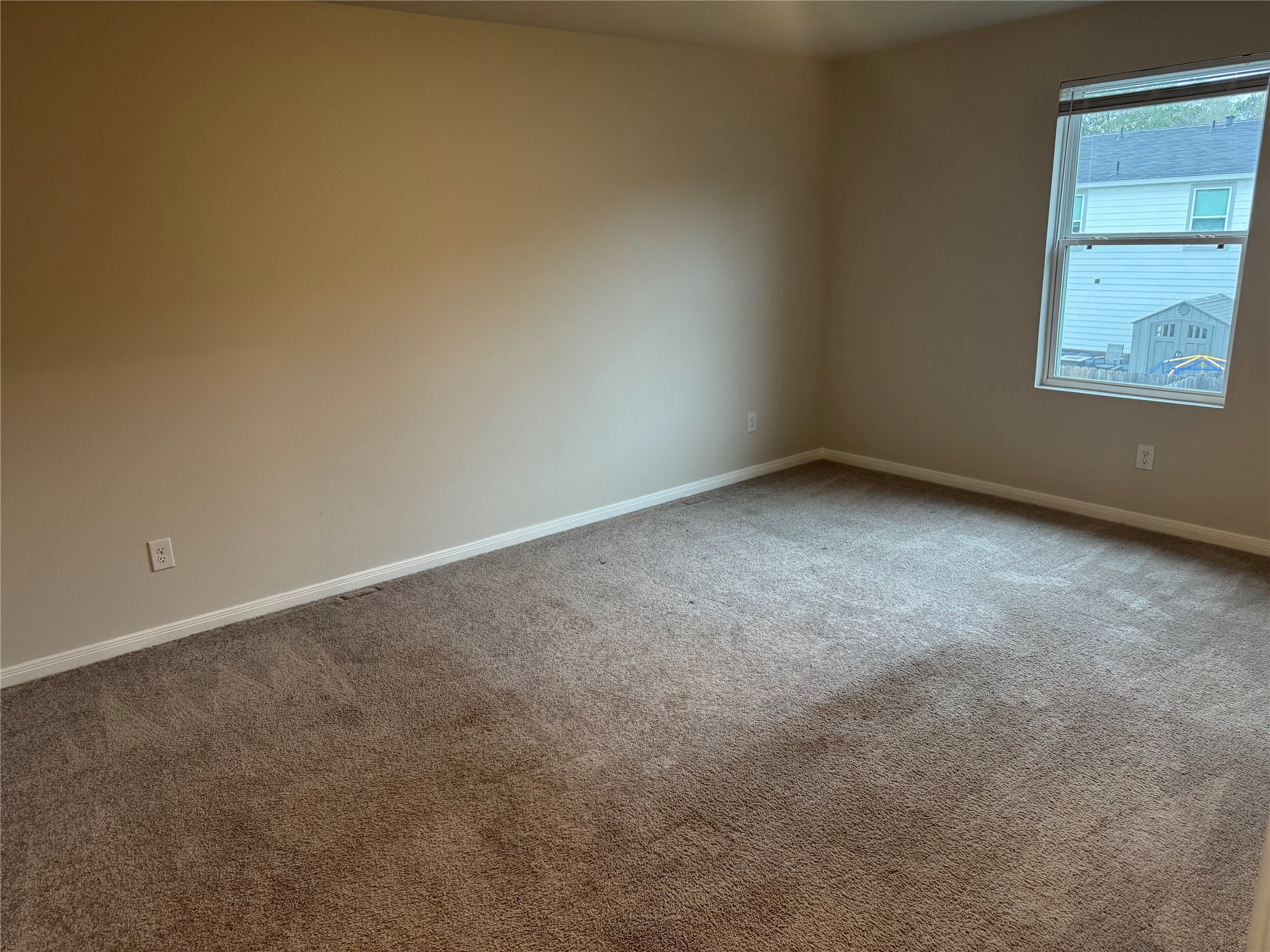 15520 Taylorcrest Drive Conroe, TX 77306 - Photo 18 of 24 an empty room with a window