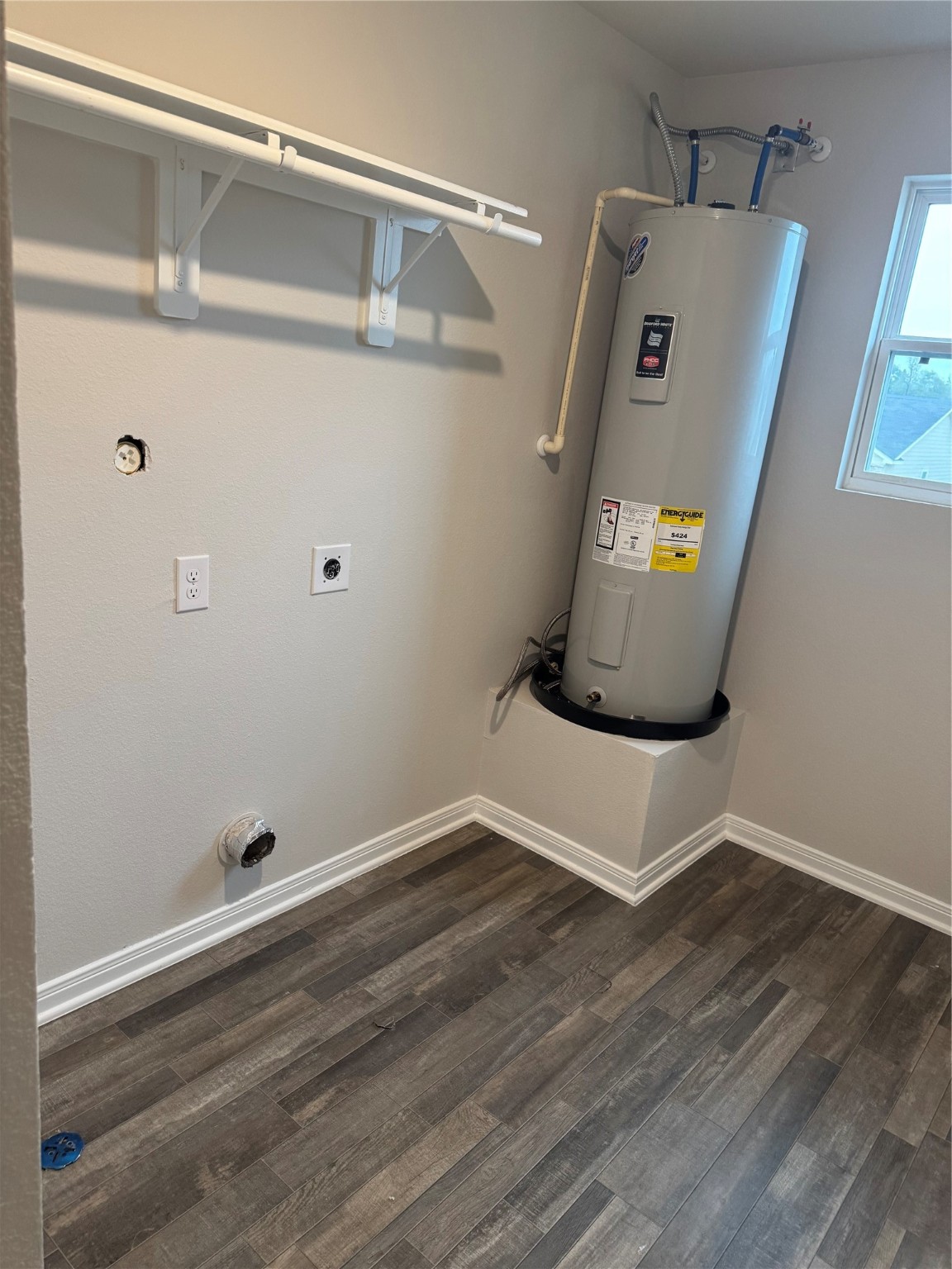 15520 Taylorcrest Drive Conroe, TX 77306 - Photo 19 of 24 a view of a storage & utility room with wooden floor