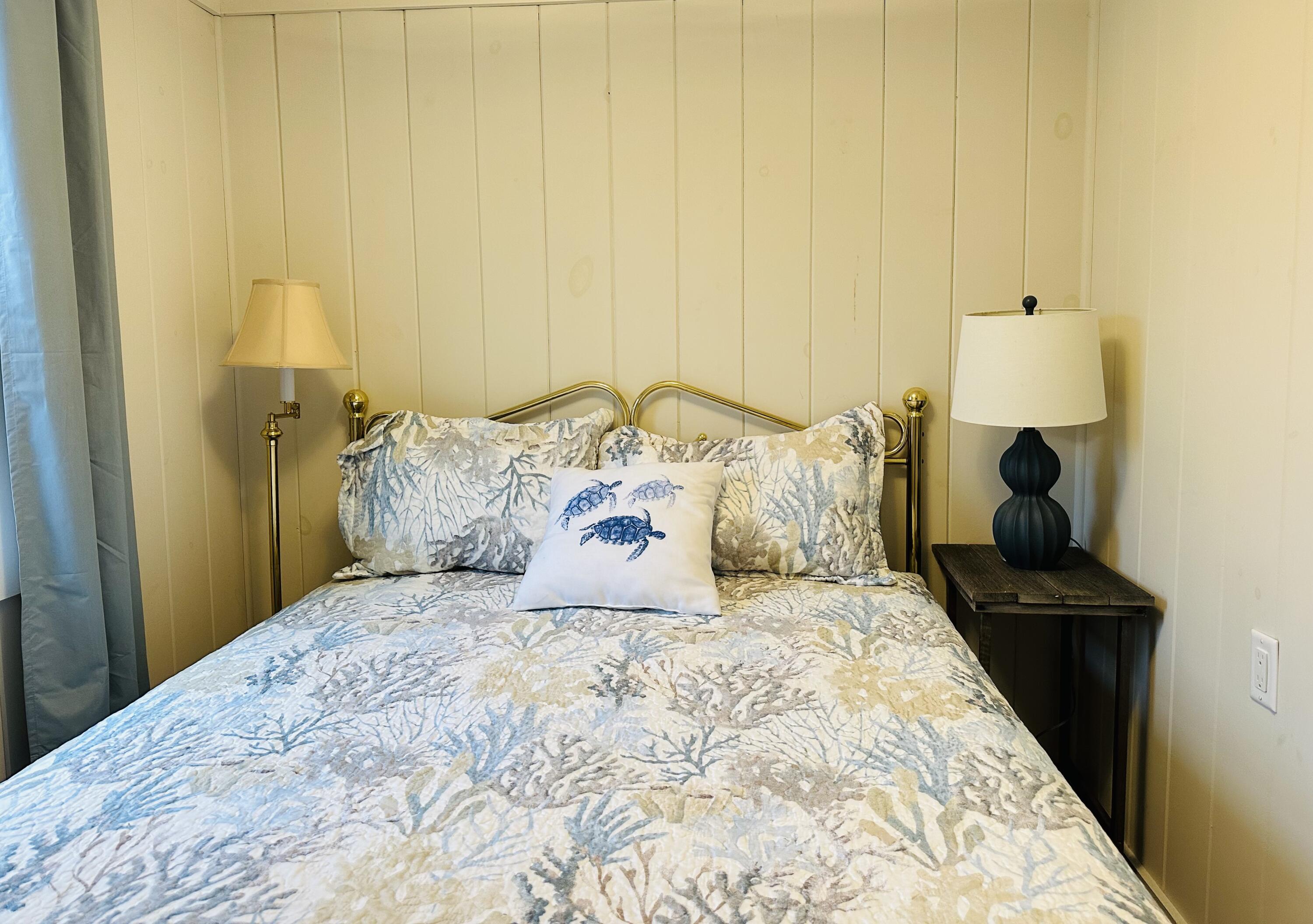 36 Cove Road Wellfleet, MA 02667 - Photo 16 of 22 a bedroom with a bed and a window