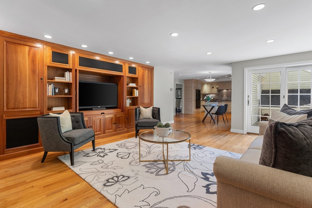 4 Bicentennial Drive Lexington, MA 02421 - Photo 18 of 35 a living room with furniture and a flat screen tv