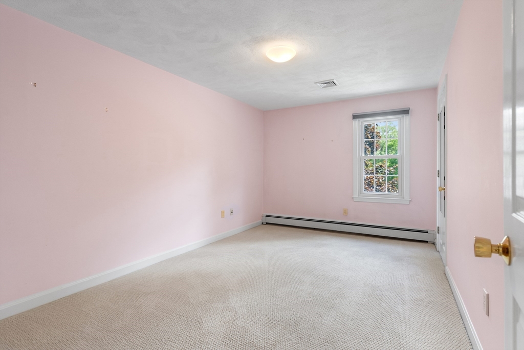 4 Bicentennial Drive Lexington, MA 02421 - Photo 24 of 35 an empty room with windows
