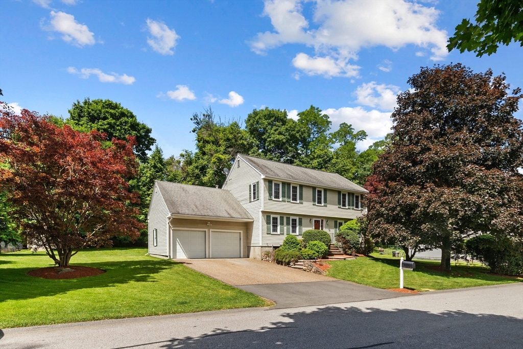 4 Bicentennial Drive Lexington, MA 02421 - Photo 3 of 35 a view of a house with a yard and potted plants