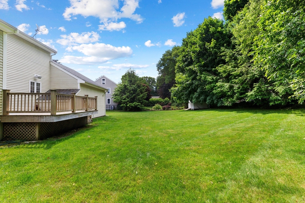 4 Bicentennial Drive Lexington, MA 02421 - Photo 4 of 35 a view of a house with a yard
