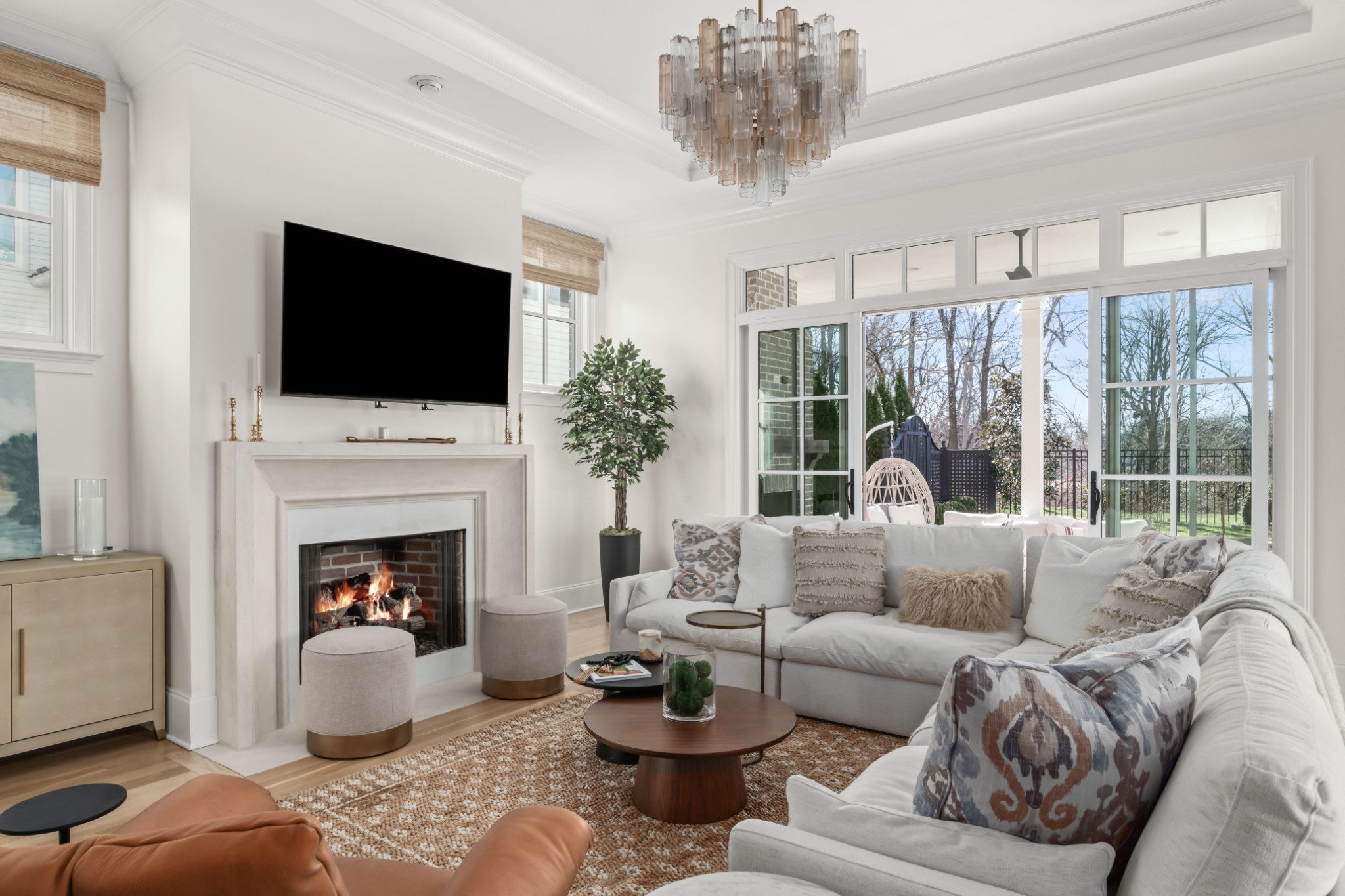 155 Splendor Ridge Drive Franklin, TN 37064 - Photo 12 of 70 a living room with furniture a fireplace and a flat screen tv