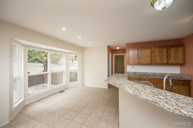 $430,000 | 999 Reddington Oaks Court, St. Charles, MO 63304