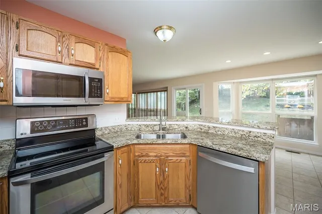 $430,000 | 999 Reddington Oaks Court, St. Charles, MO 63304