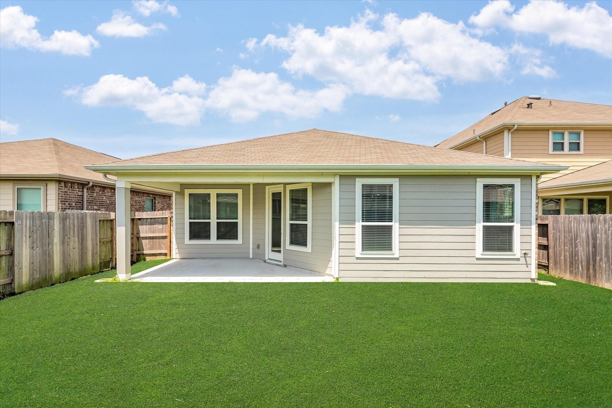 1111 Swinford Court Conroe, TX 77304 - Photo 19 of 21 Spacious backyard and covered patio