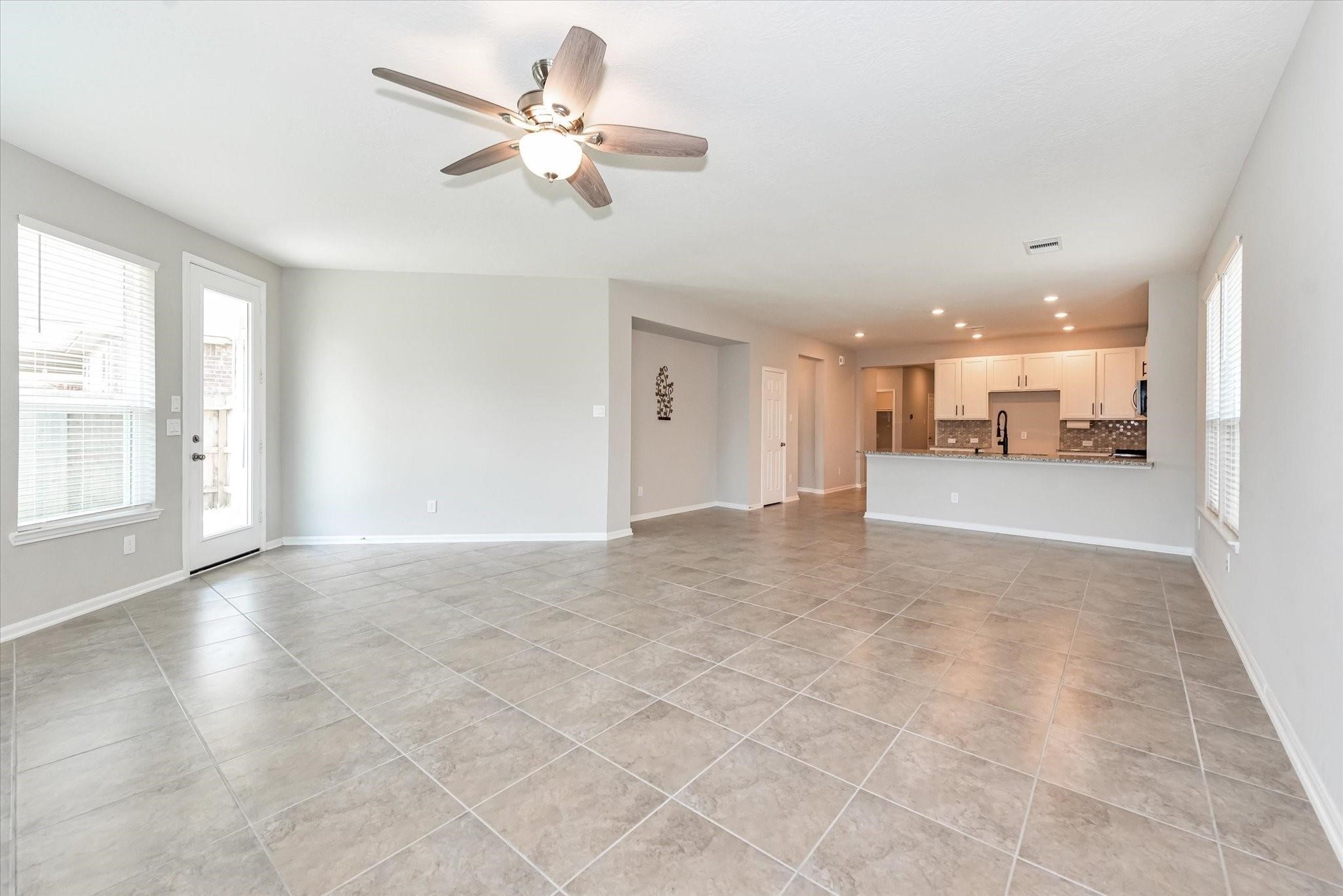 1111 Swinford Court Conroe, TX 77304 - Photo 3 of 21 HUGE living and dining combo