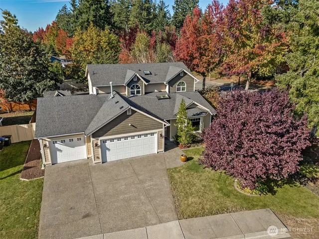 a house with a tree in front of it