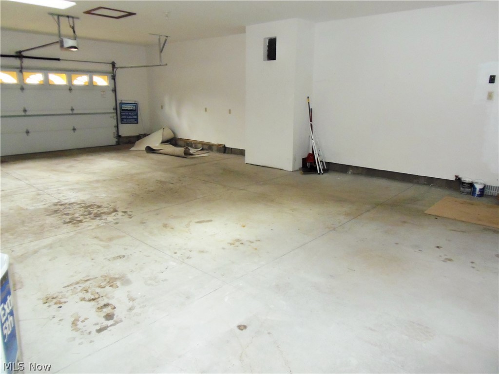 4586 South Arlington Road Uniontown, OH 44685 - Photo 32 of 35 840 square foot attached garage with 2 skylights