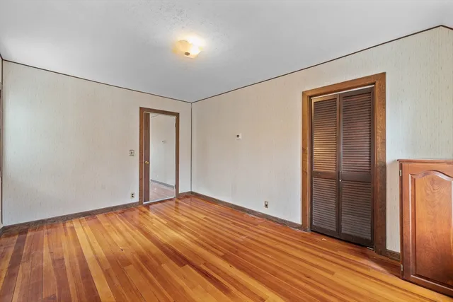 a view of a livingroom with wooden floor