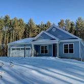 a view of a house with a garden