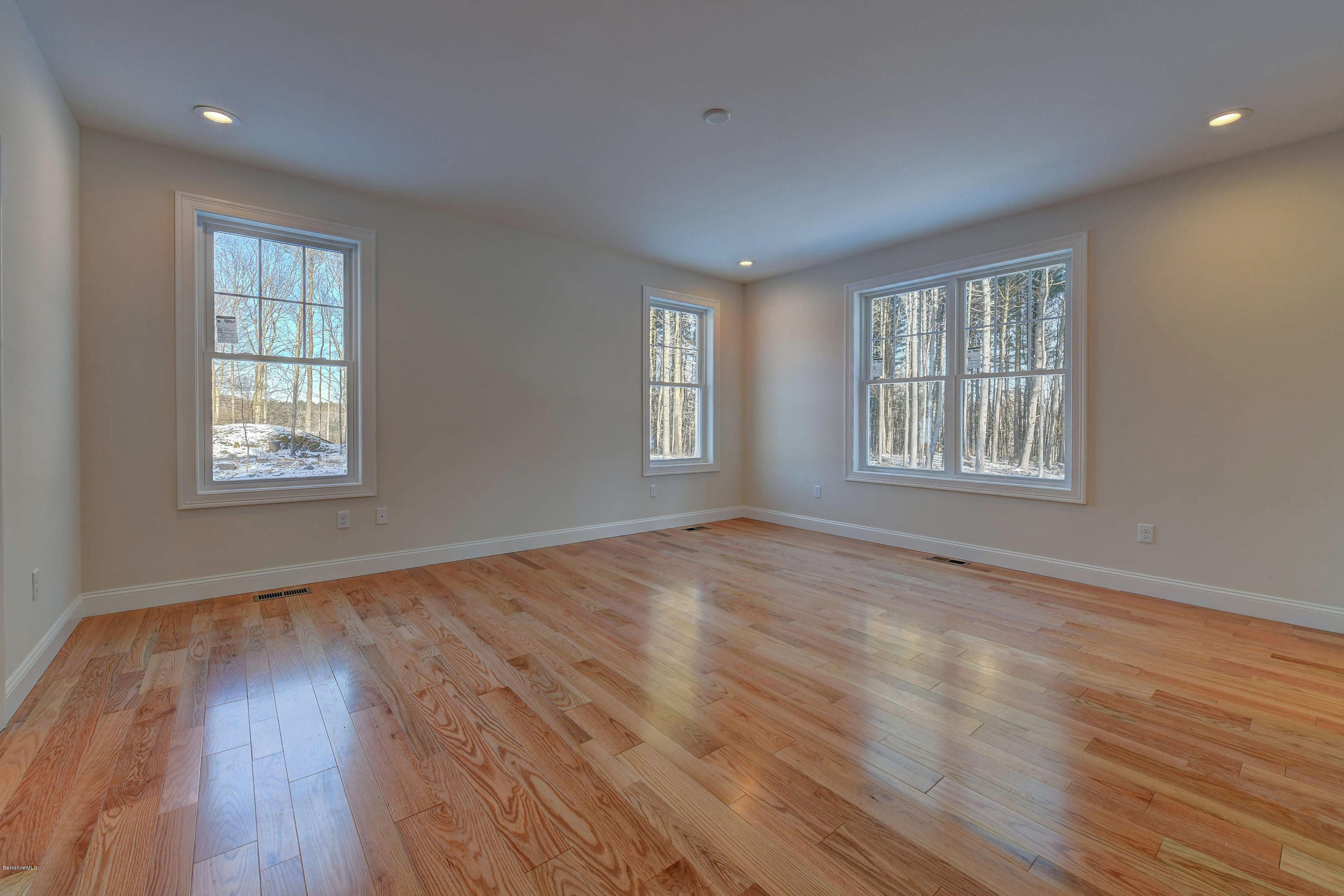 1 B West Dale Road Stockbridge, MA 01262 - Photo 14 of 26 an empty room with wooden floor and windows