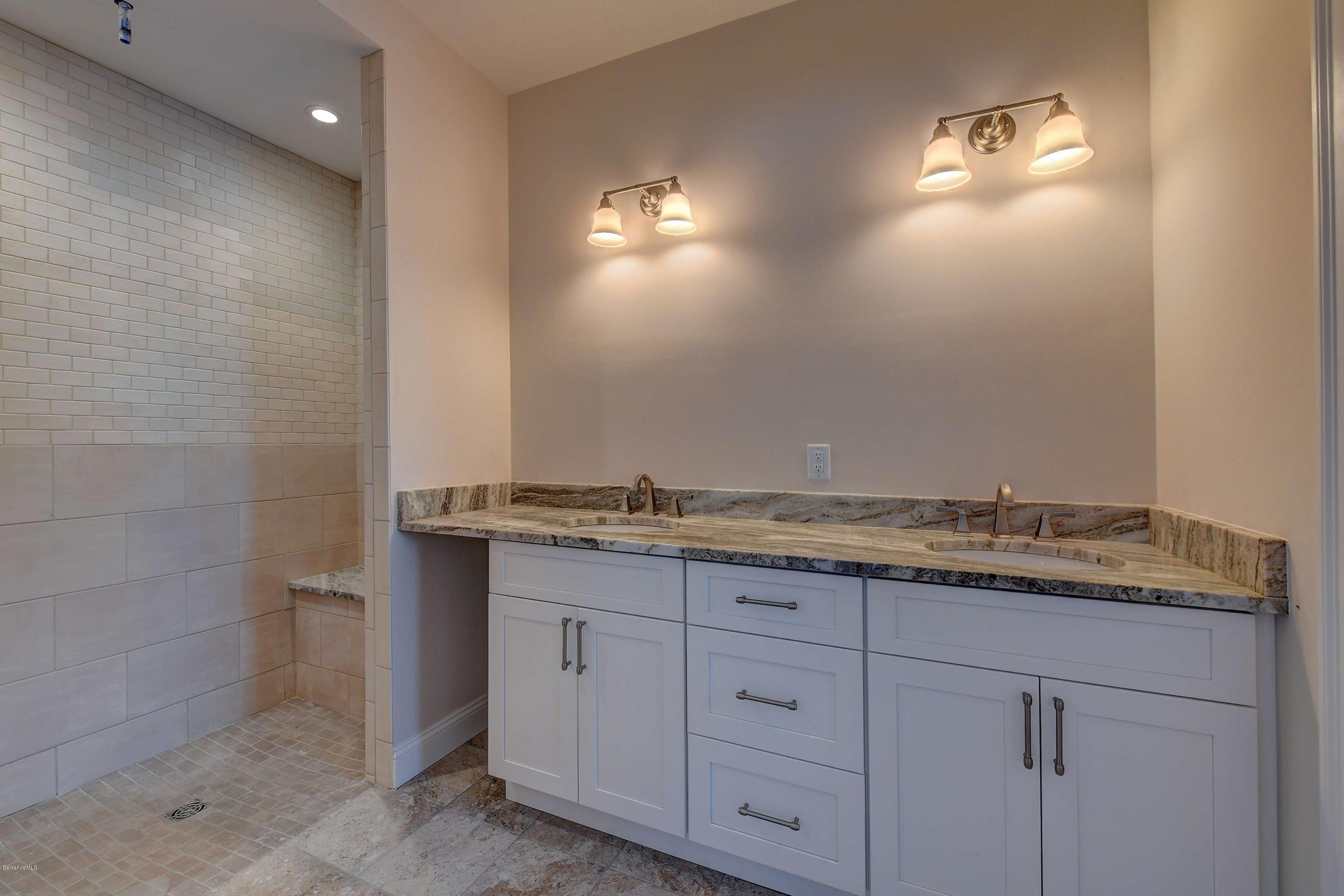 1 B West Dale Road Stockbridge, MA 01262 - Photo 16 of 26 a bathroom with a granite countertop sink and a mirror