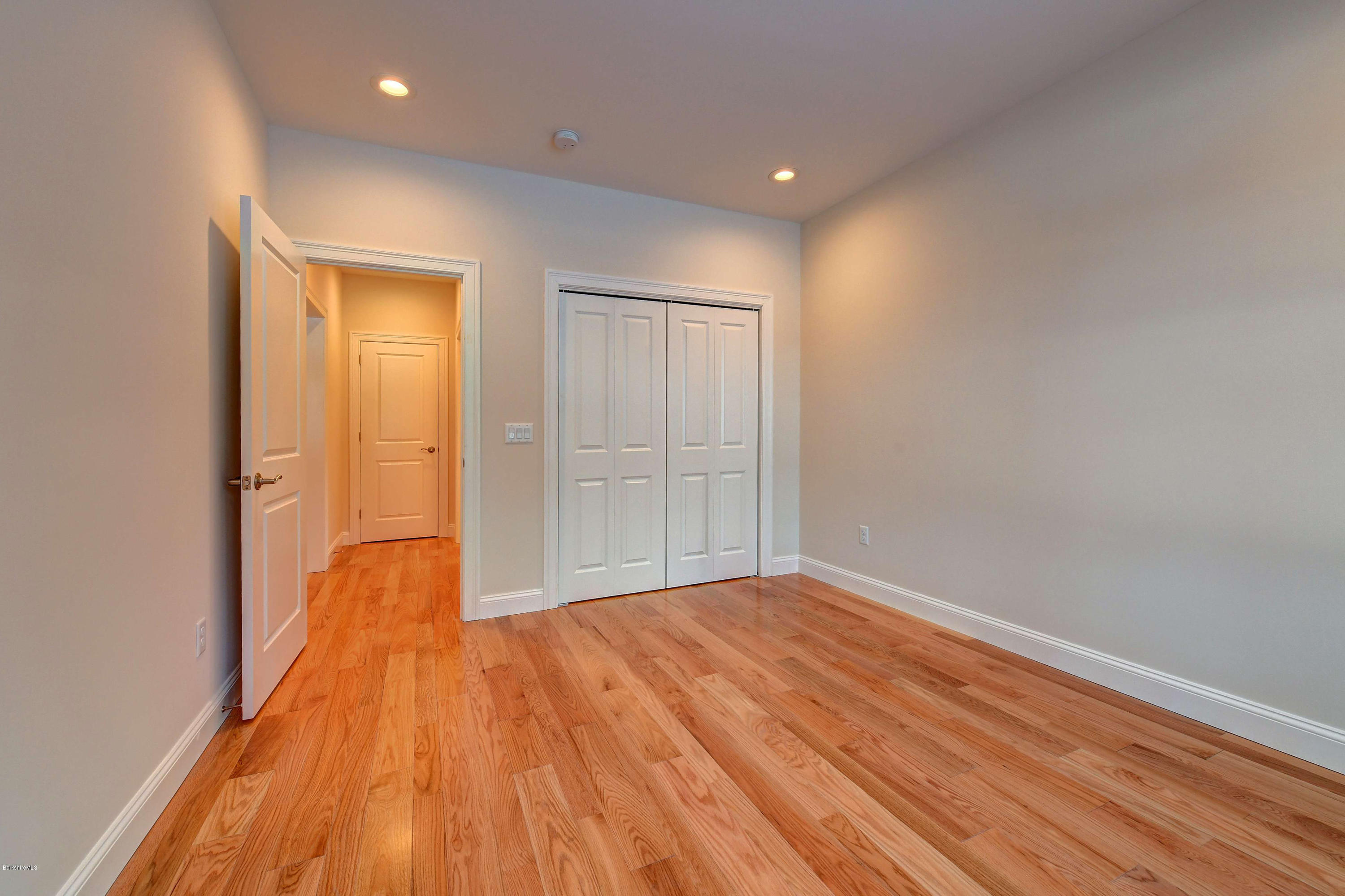 1 B West Dale Road Stockbridge, MA 01262 - Photo 21 of 26 wooden floor in an empty room with a window