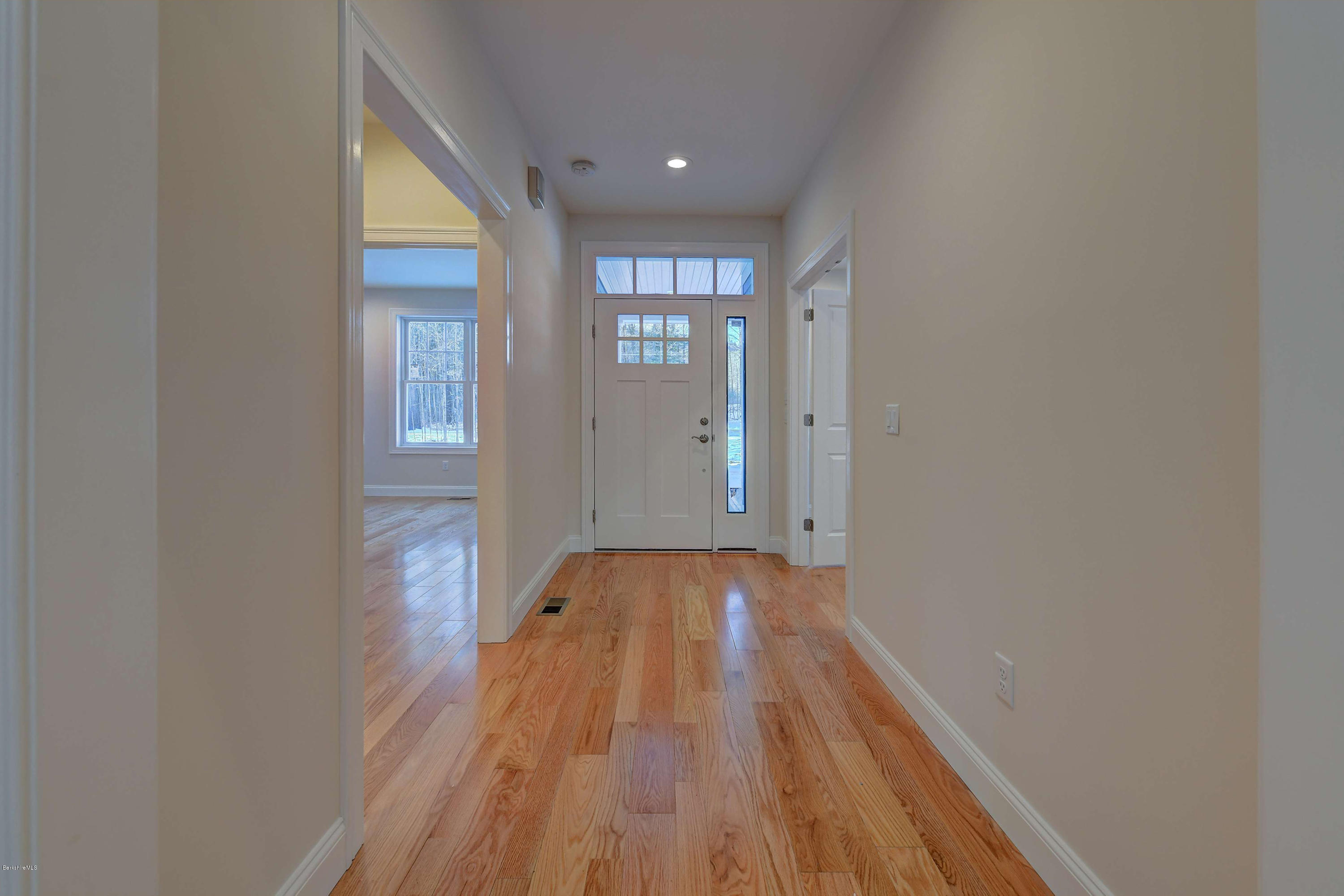 1 B West Dale Road Stockbridge, MA 01262 - Photo 4 of 26 a view of an empty room with wooden floor and a window